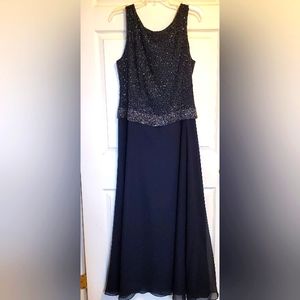A full length evening gown. In perfect condition Worn once. Beautiful beading.